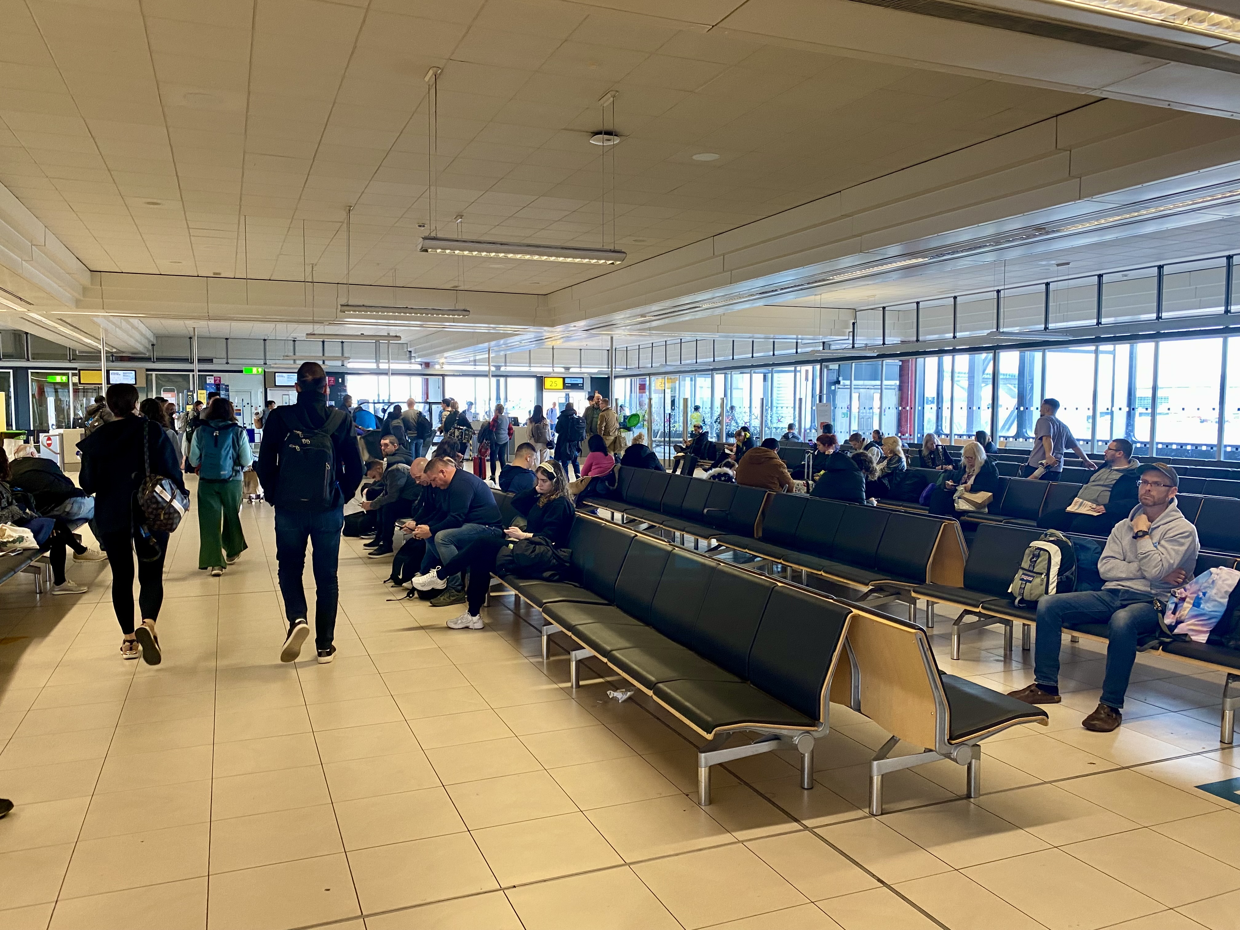 a group of people in a terminal