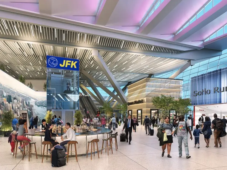 a group of people in a large airport