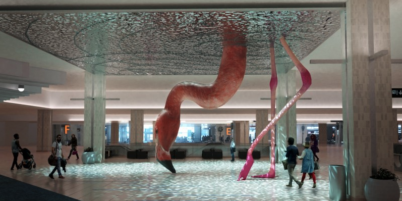 a large flamingo statue in a building