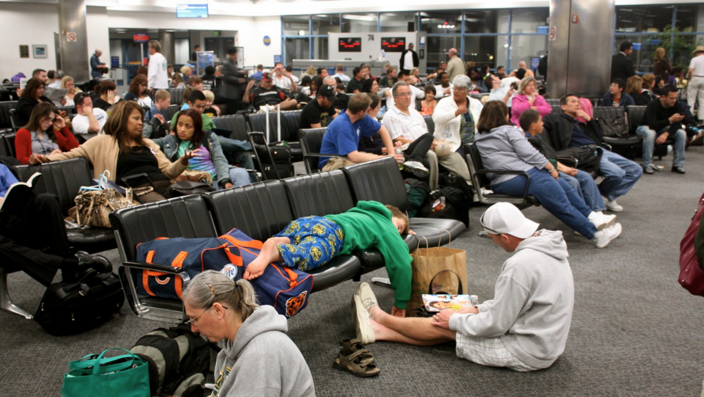 a group of people sitting in a waiting room