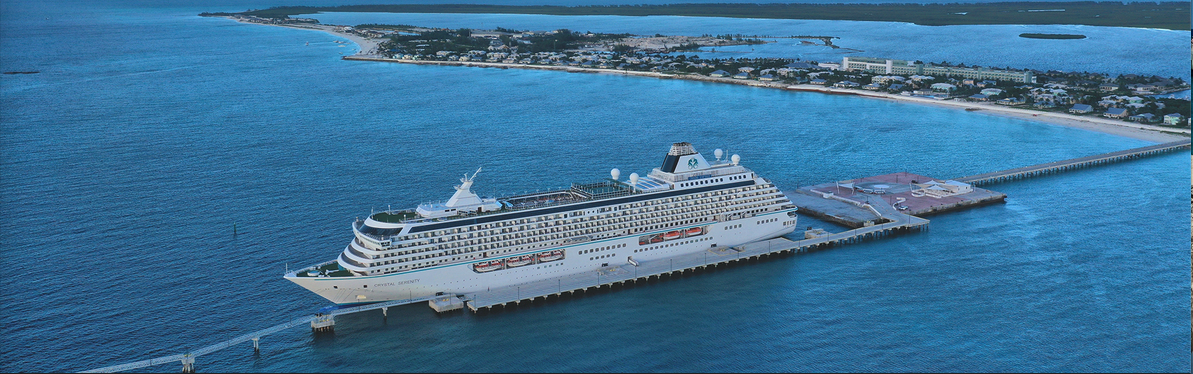 a cruise ship docked at a dock