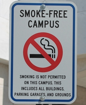a sign with a no smoking sign