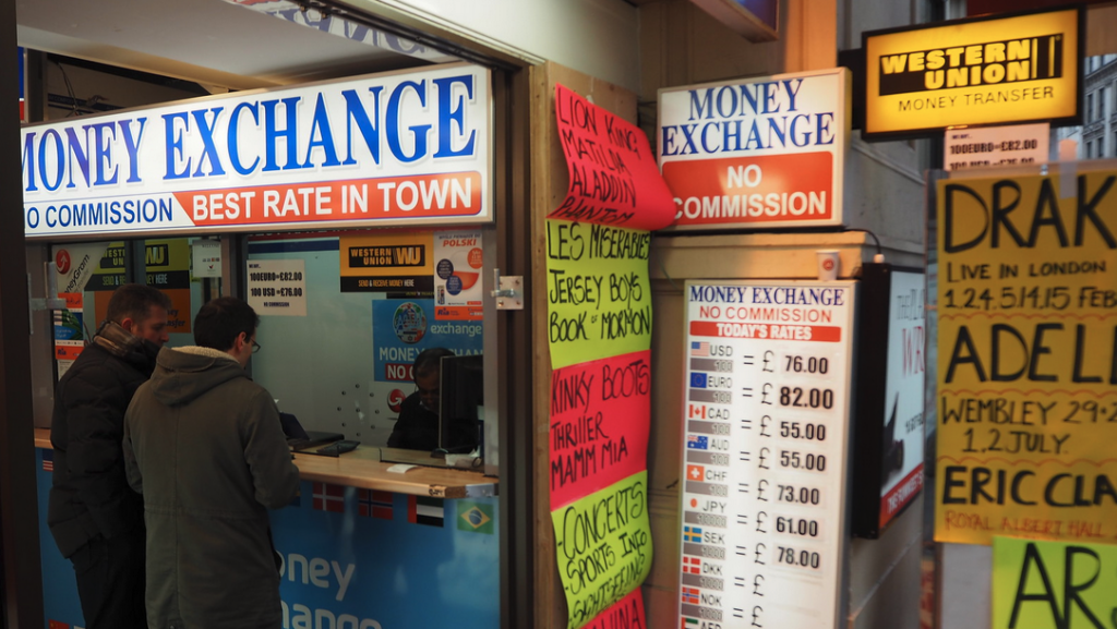 a man standing in front of a store