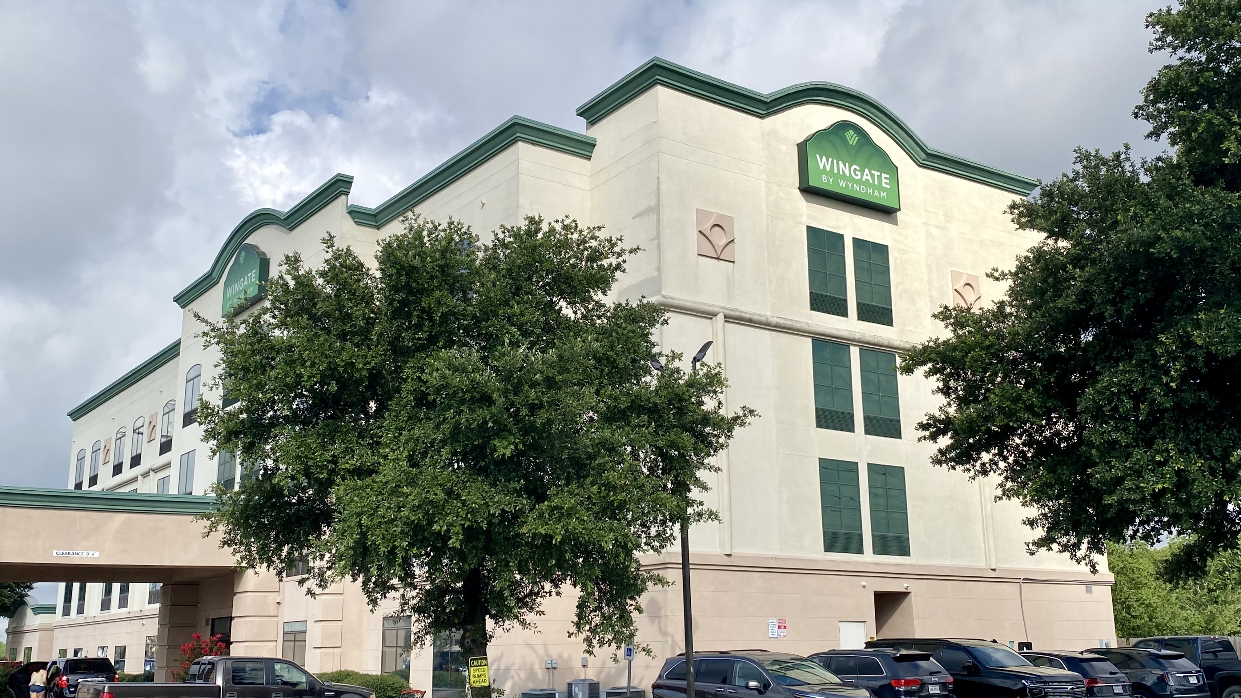 a building with a tree in front of it