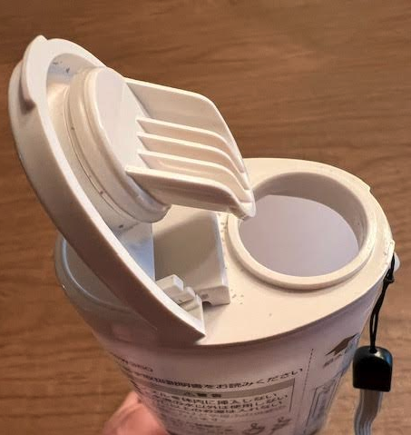 a white container with a plastic lid
