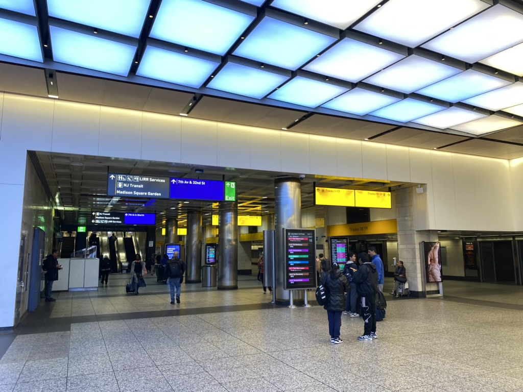 people in a building with a large group of people