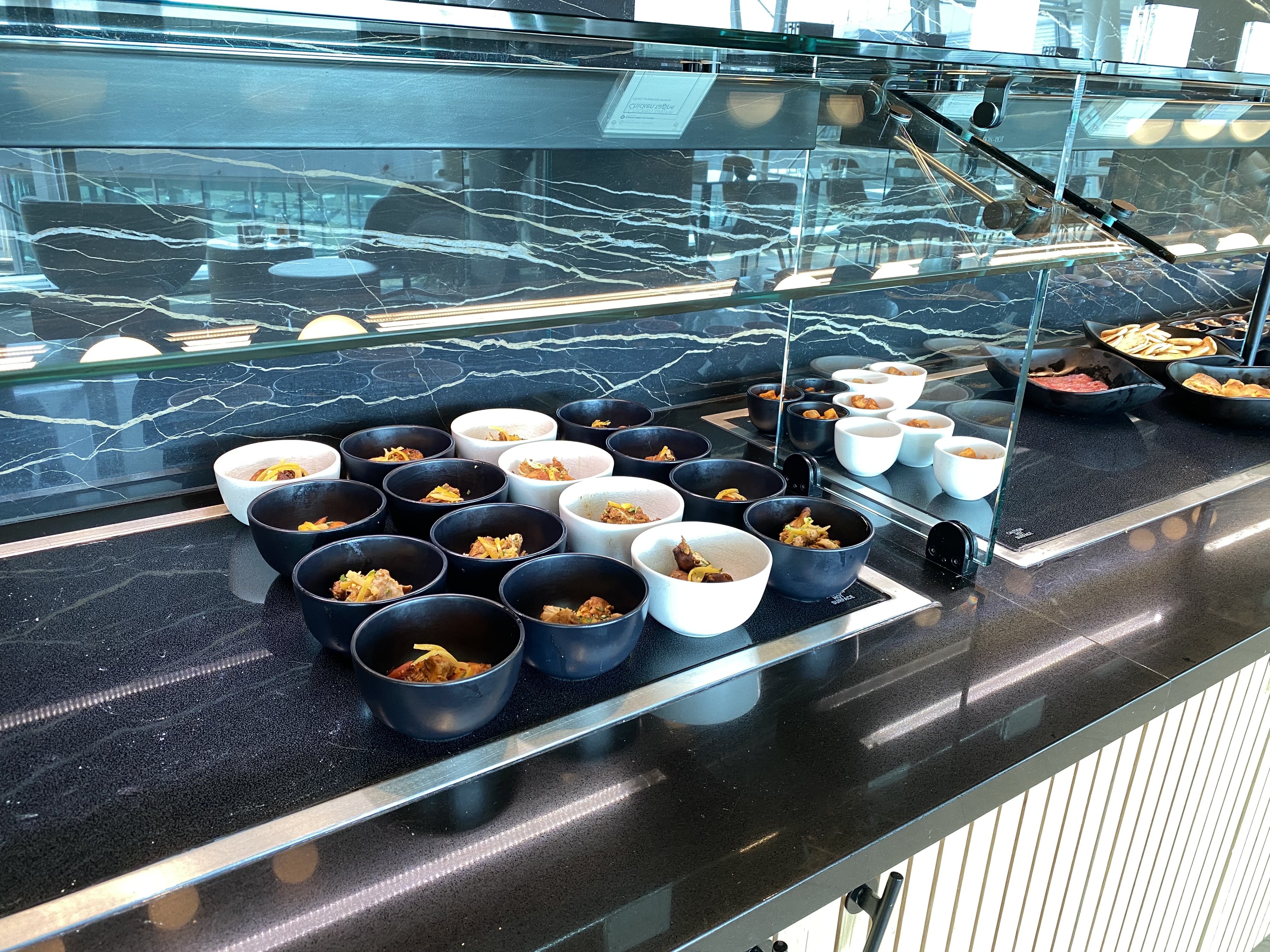 a buffet with food in bowls