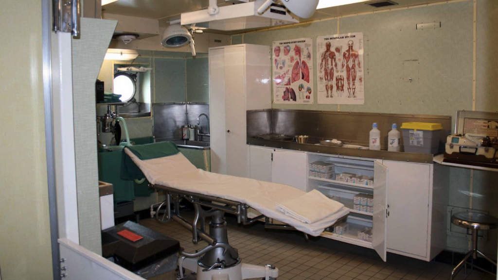 a medical room with a stretcher