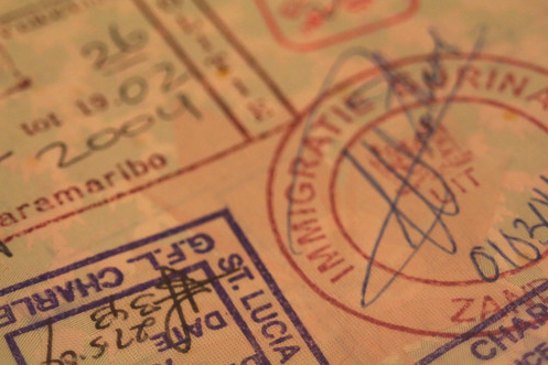 close-up of a passport with stamps