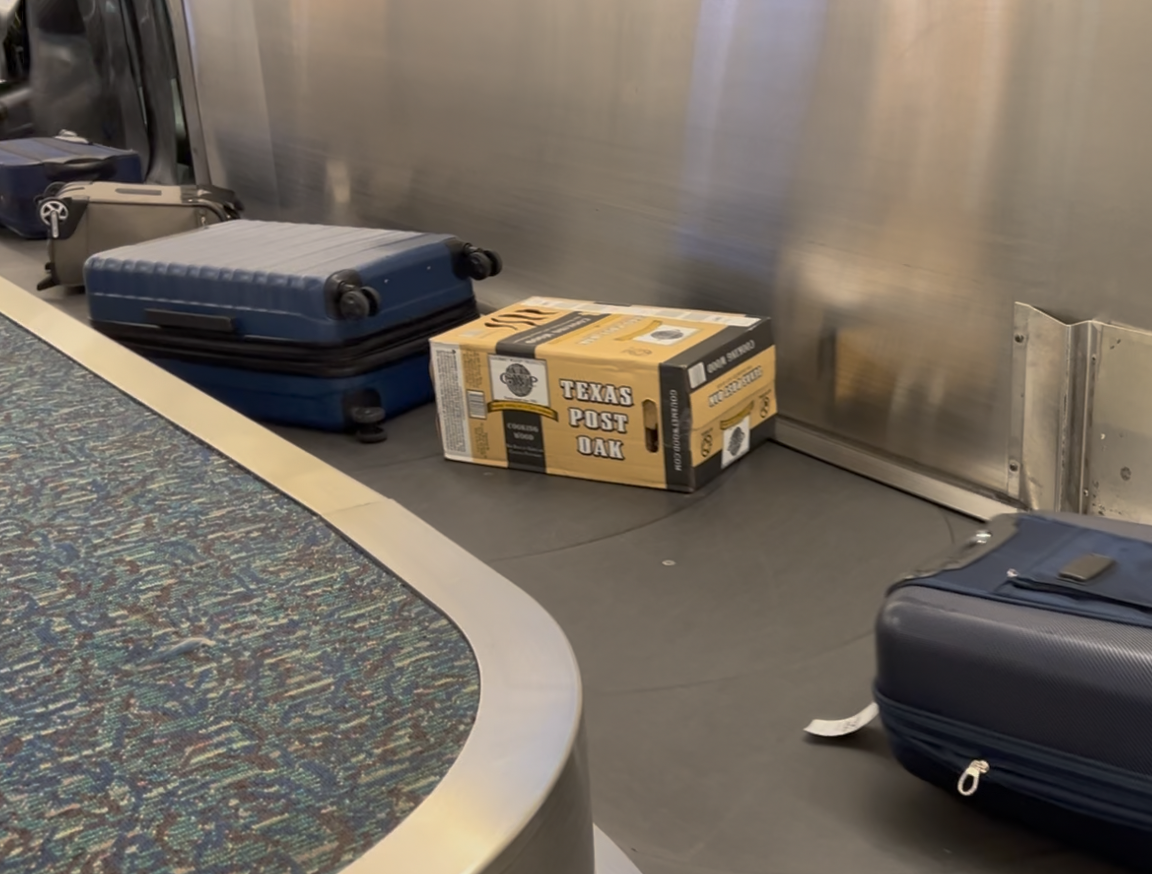 luggage on the floor of a train