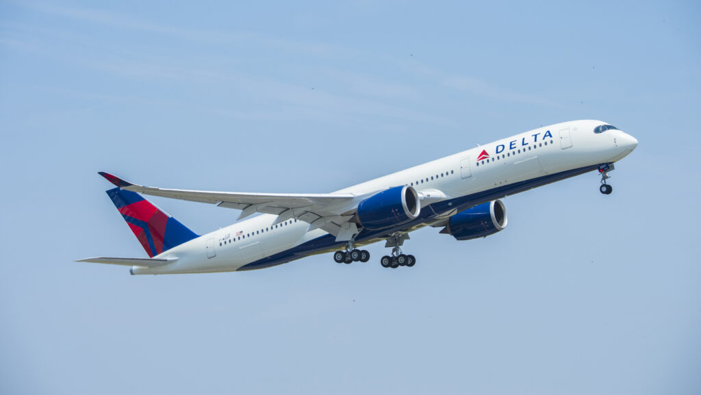 a large airplane flying in the sky