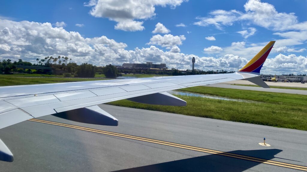 an airplane wing on a runway