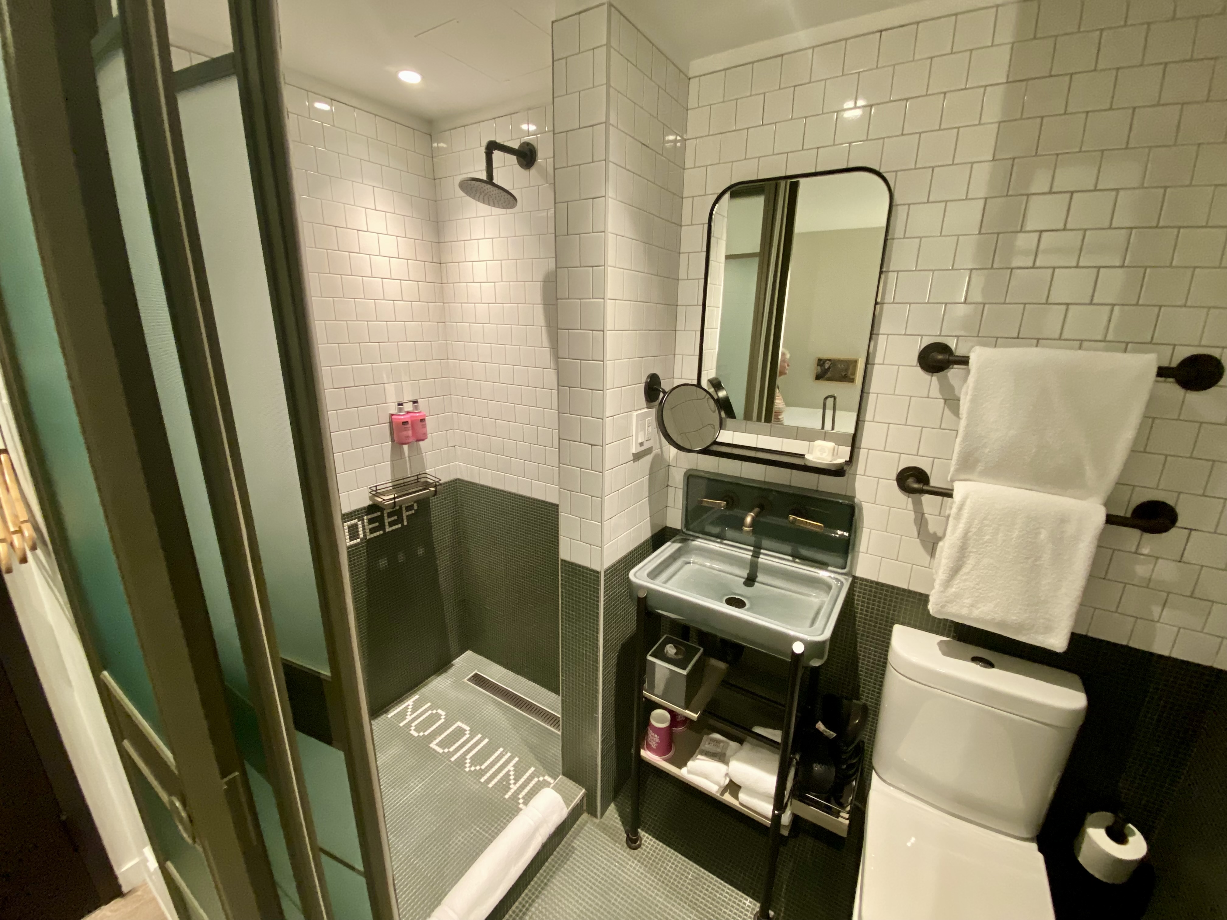 a bathroom with a sink and toilet