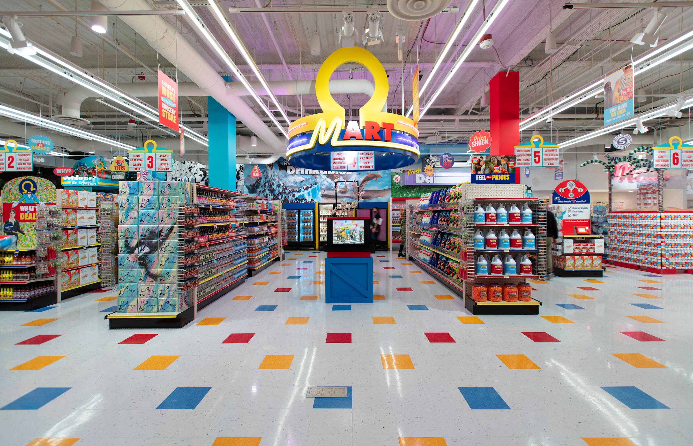 a store with shelves of beverages and toys