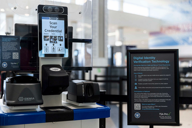 a machine with a screen and a sign