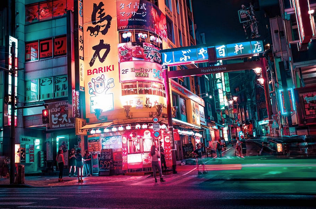 a street with signs and people walking on it