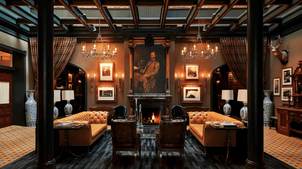 a room with a fireplace and couches