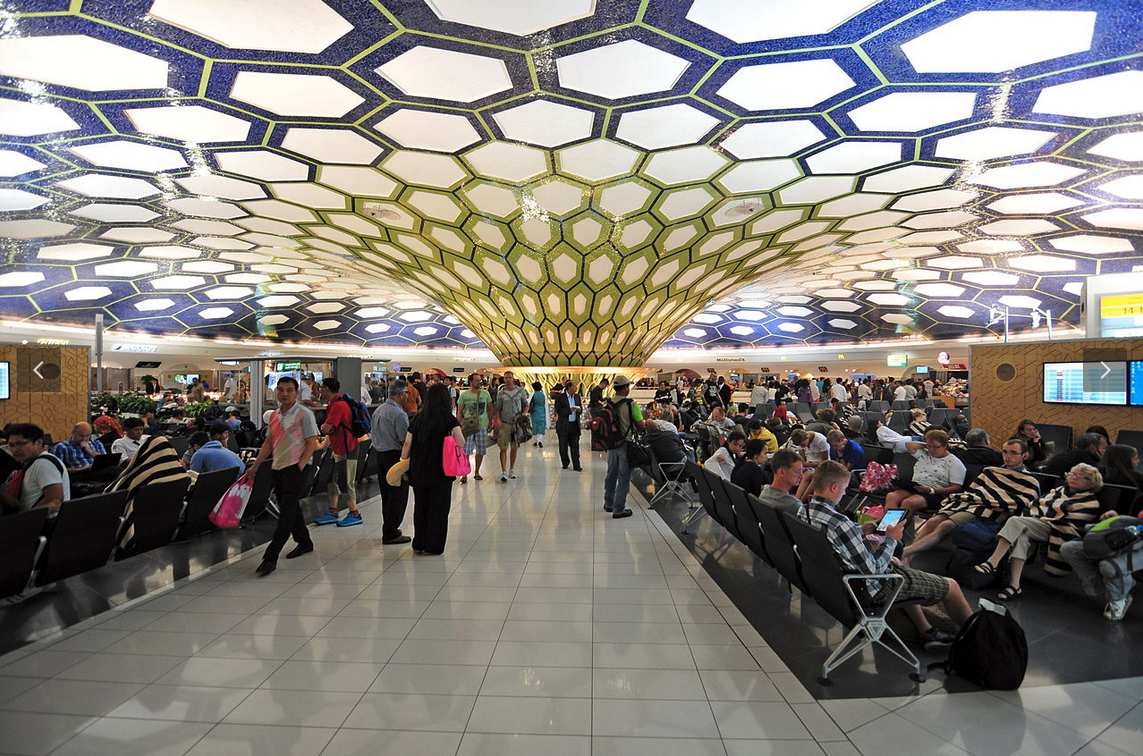 a group of people in an airport