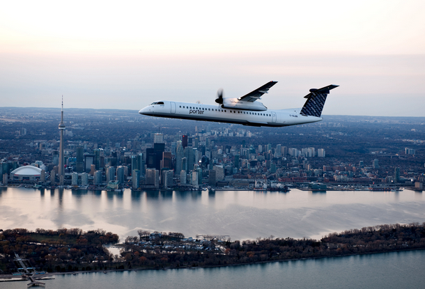 a plane flying over a city