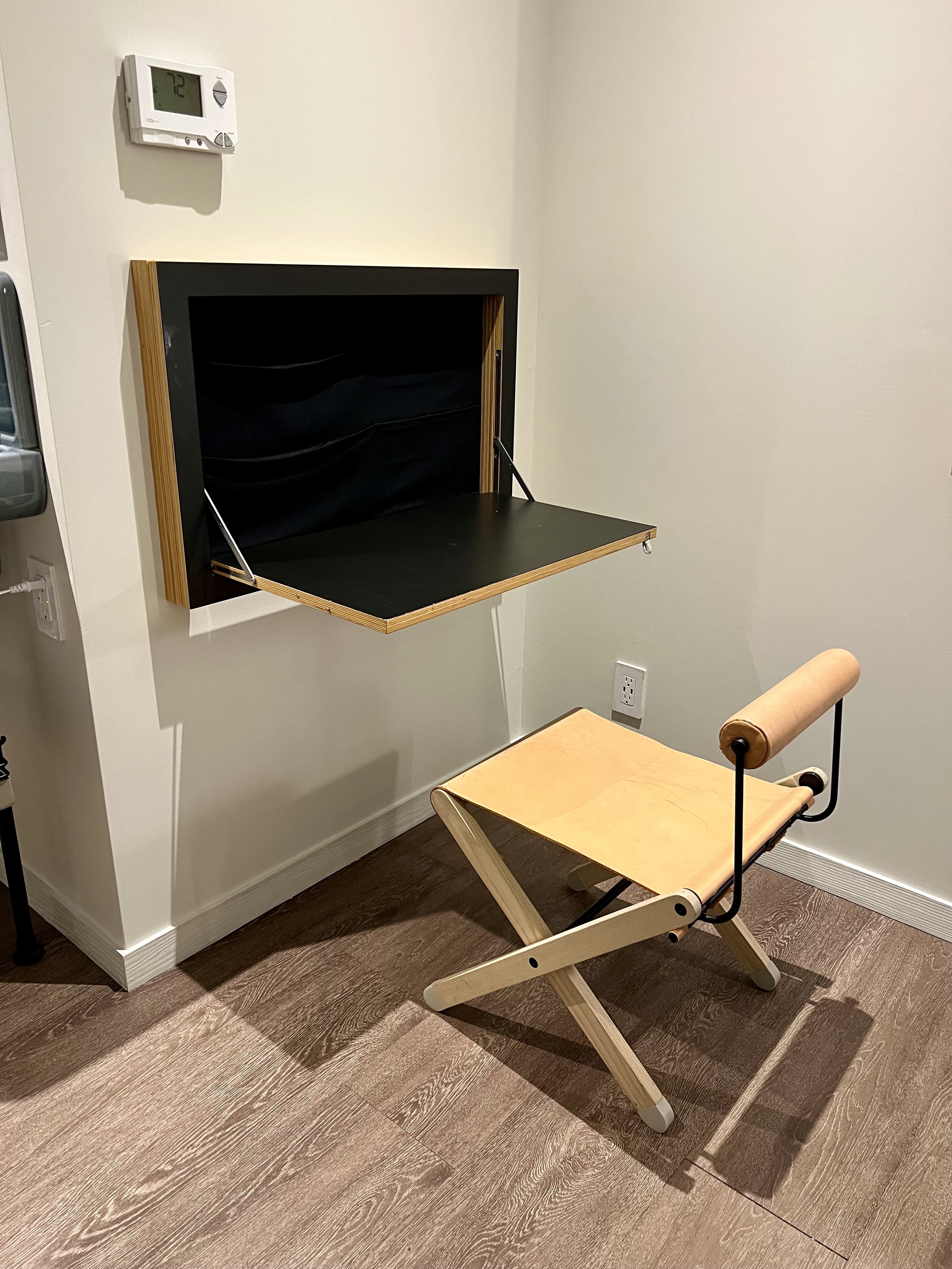 a folding chair and a table