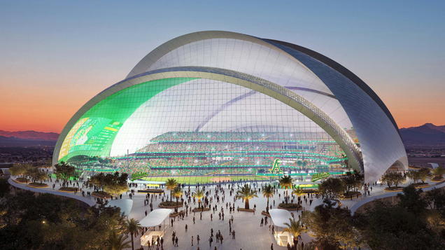 a large glass dome with a green and white light