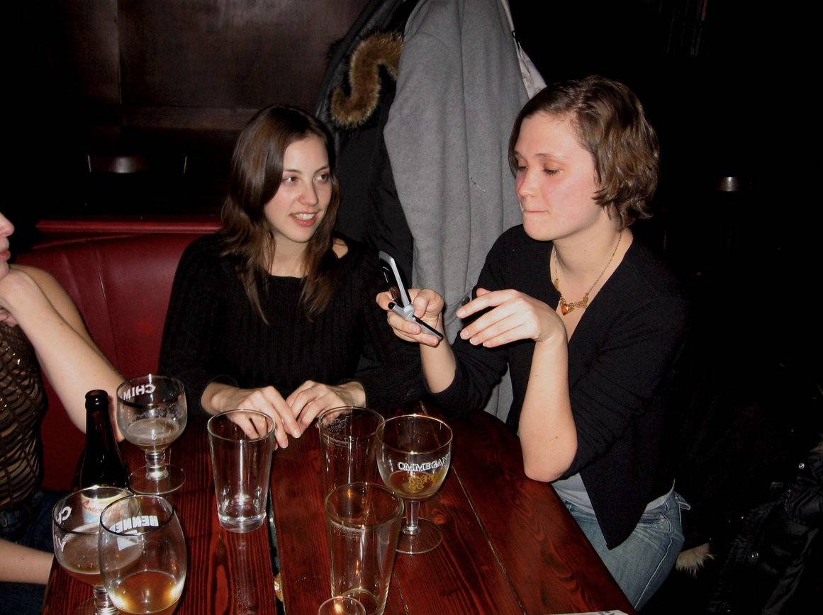 a group of women sitting at a table