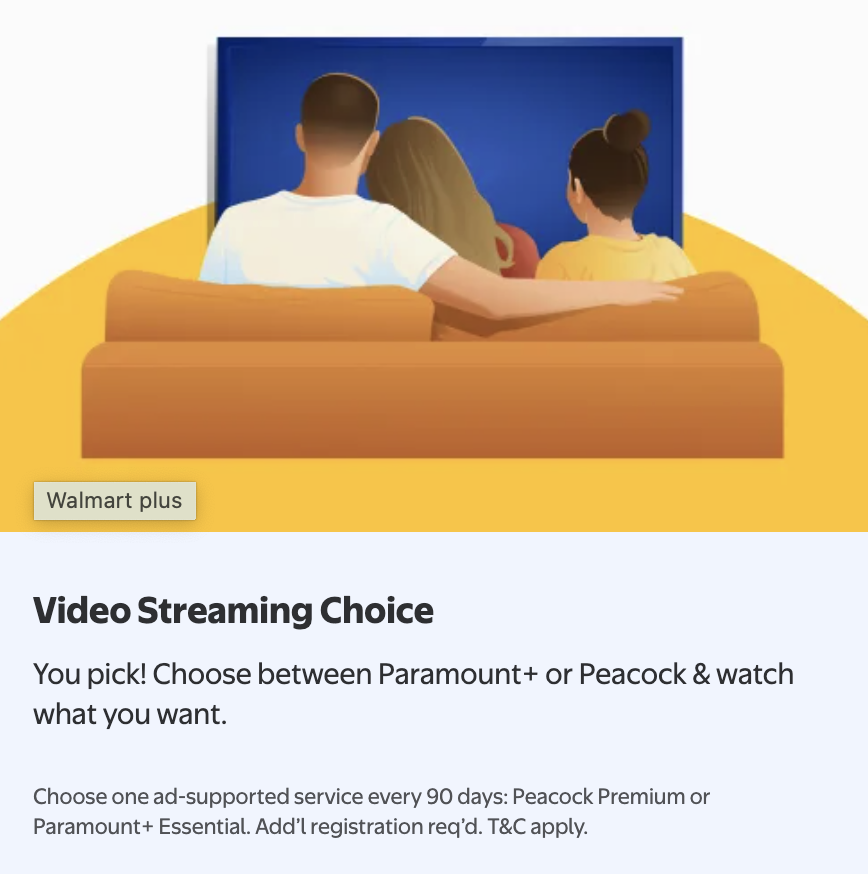 a group of people sitting on a couch watching a movie