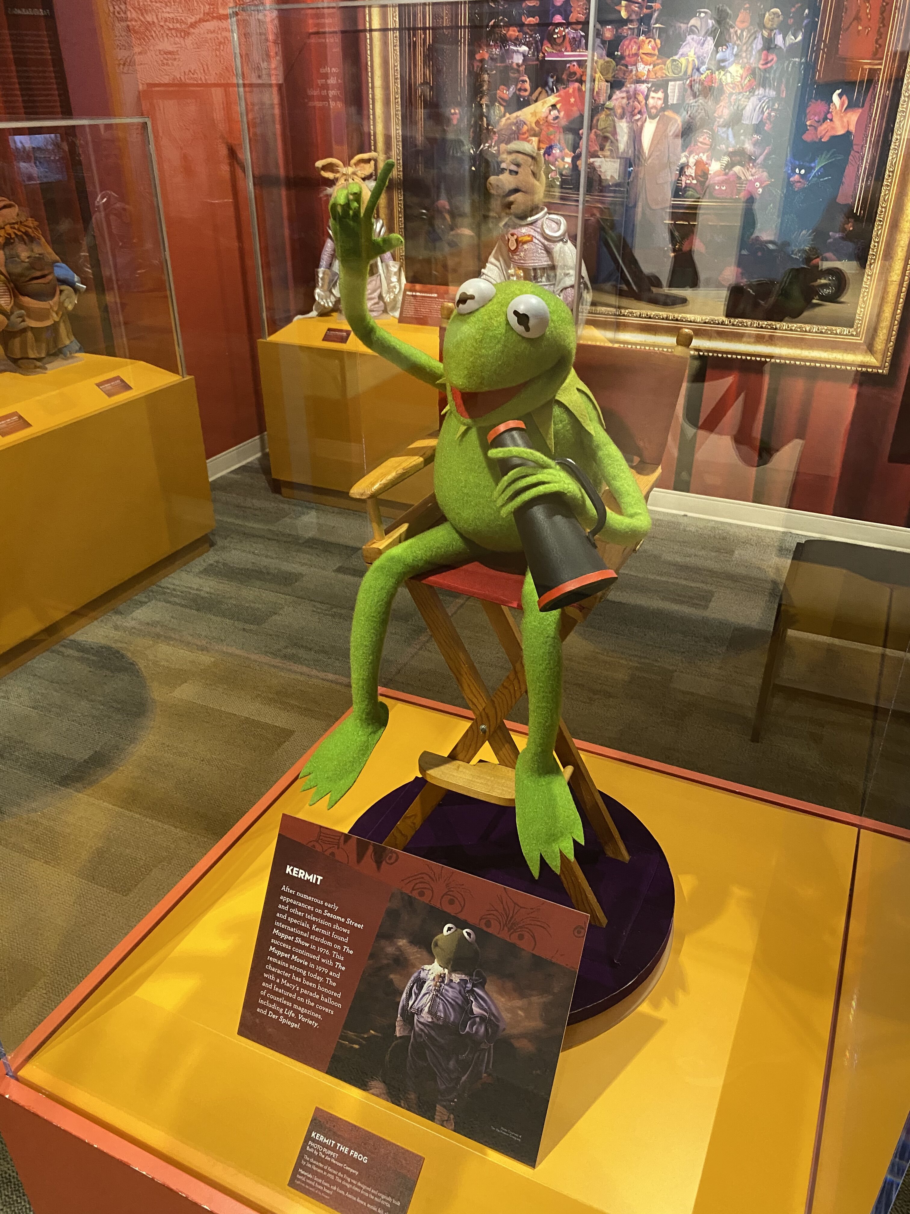 a puppet sitting on a chair