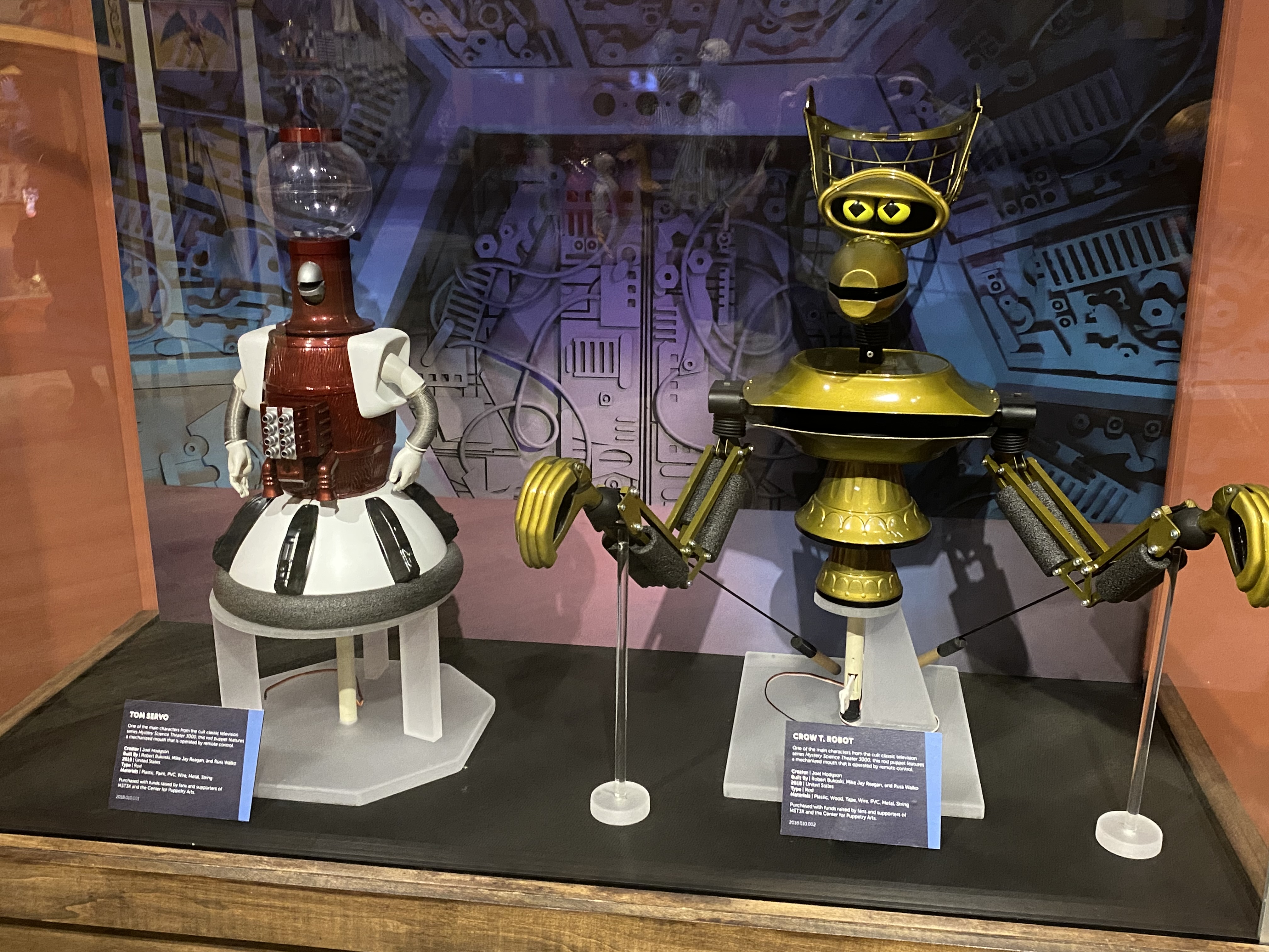 a group of robots on display