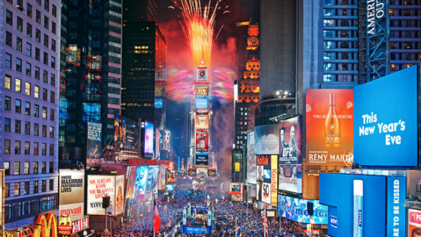 a large crowd of people in Times Square