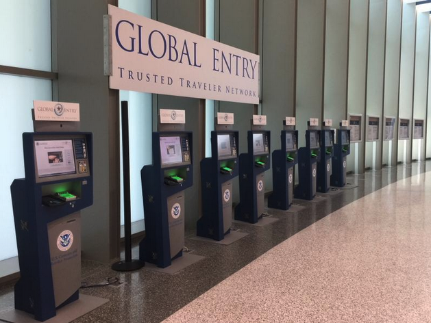 a row of blue kiosks in a row