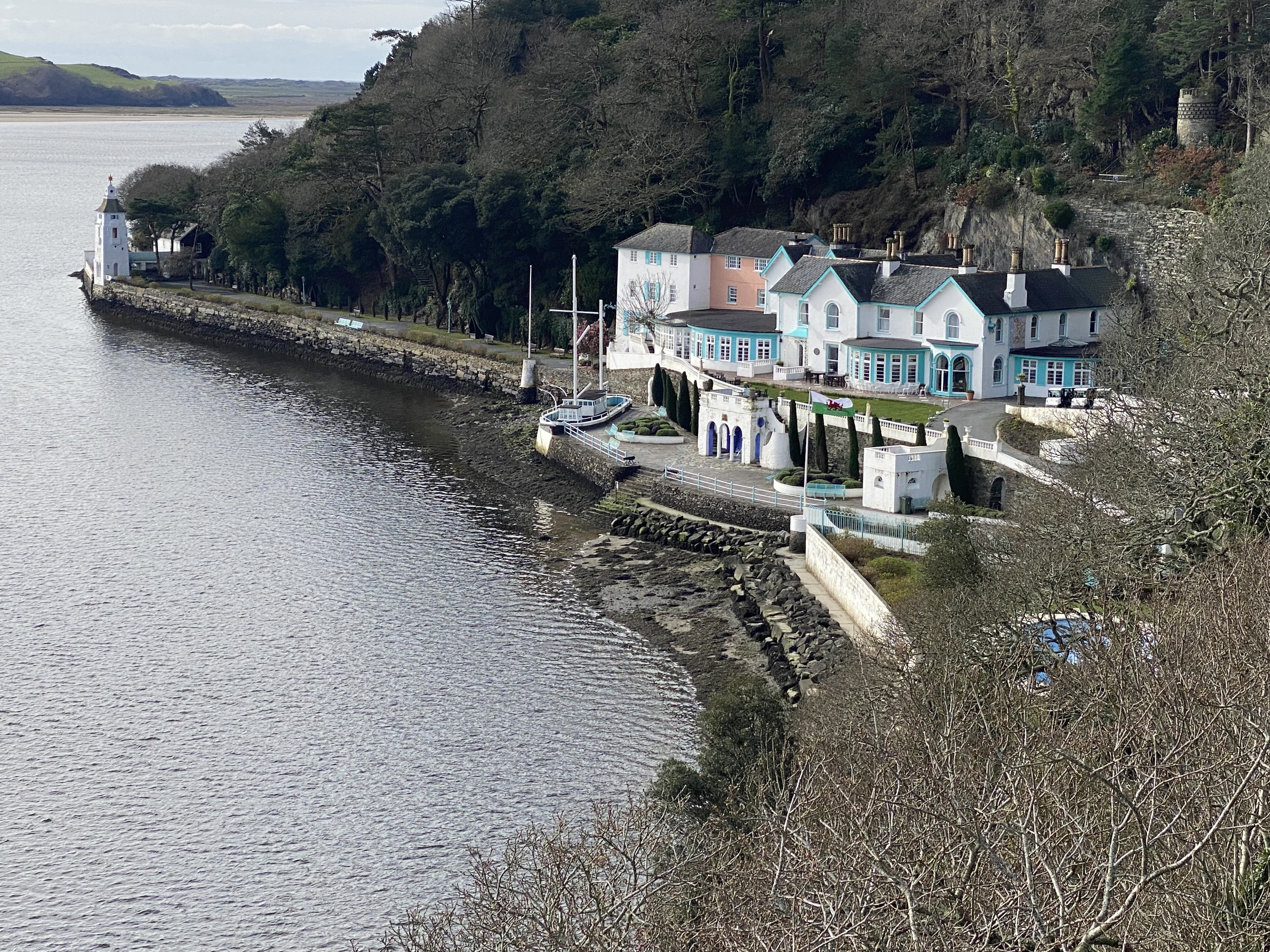 a house next to a body of water