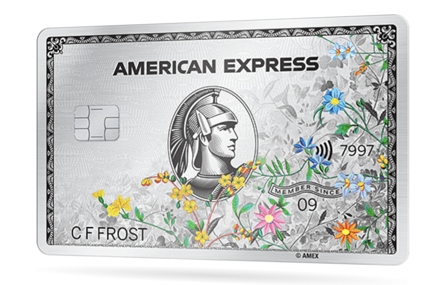 a silver credit card with flowers and a picture of a man