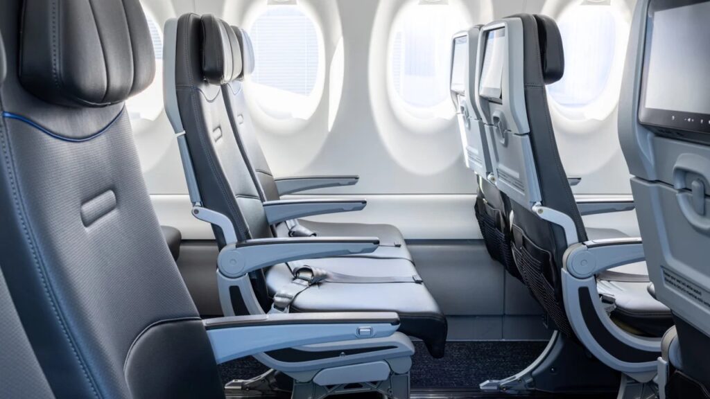 seats in an airplane with windows and seats