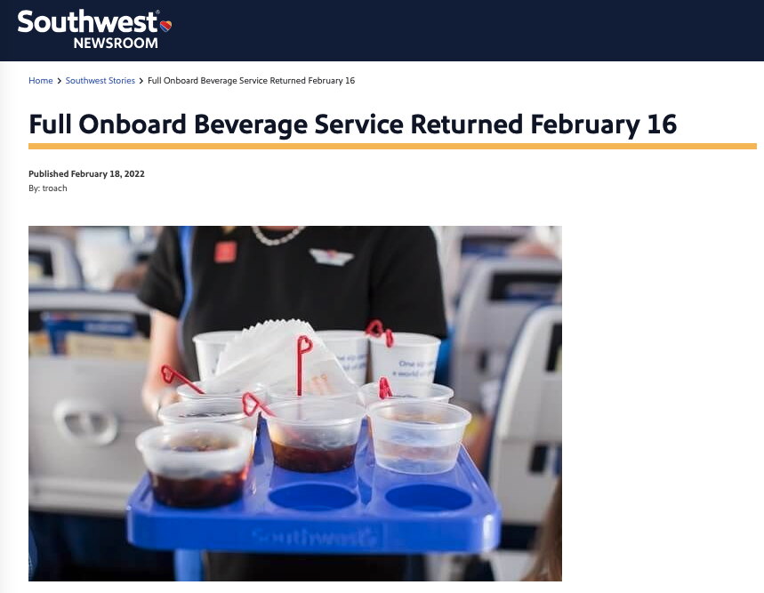 a tray of drinks on a flight