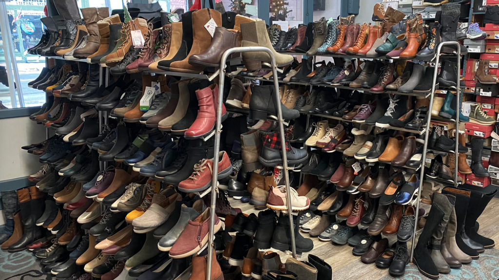 a rack of shoes in a shoe store