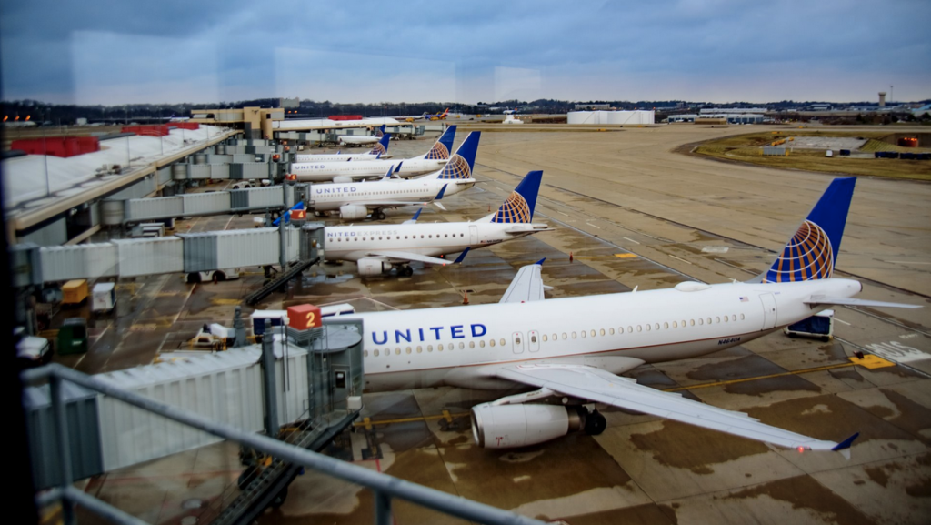 airplanes parked at an airport