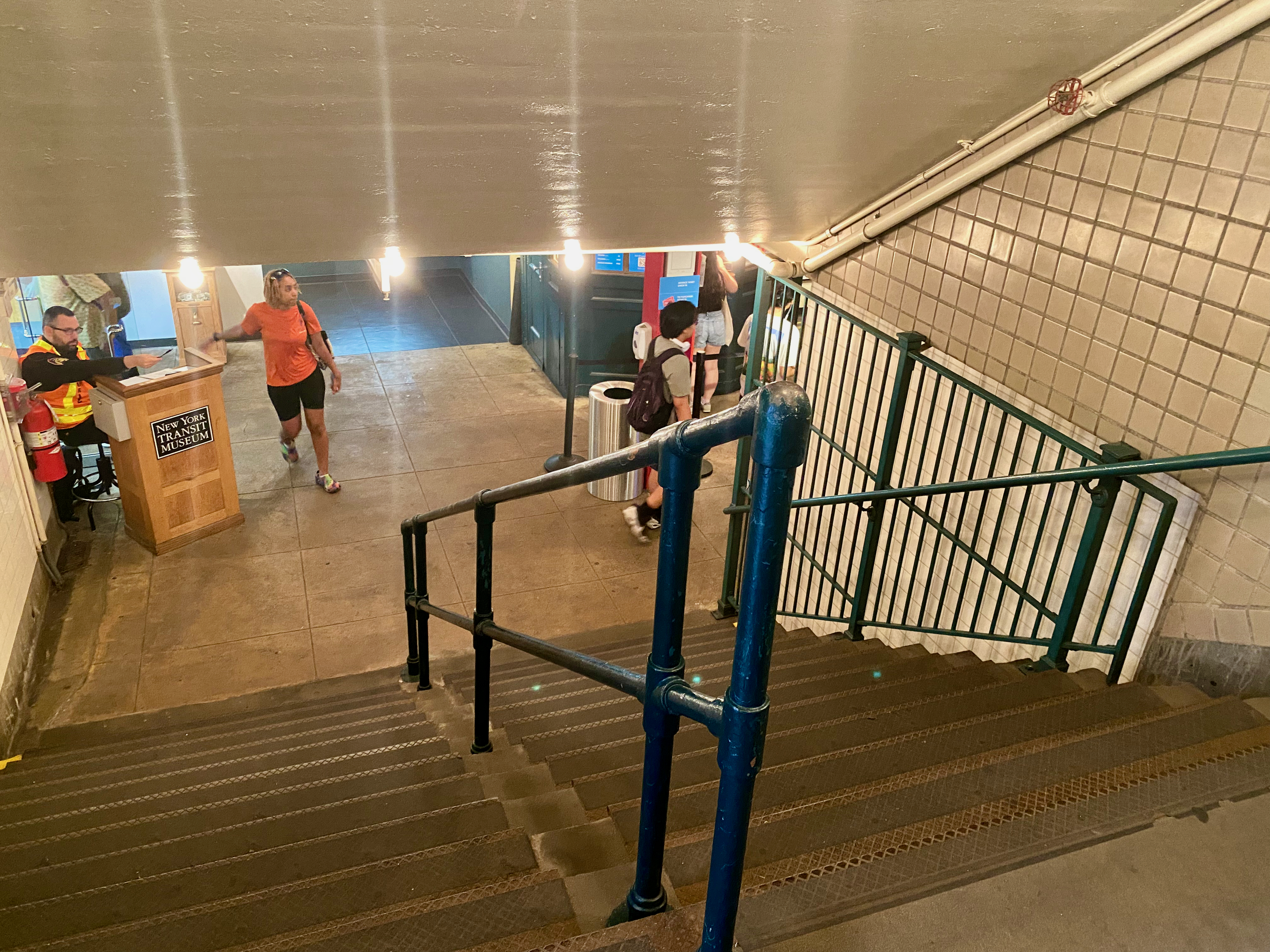 a group of people walking down a staircase