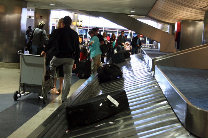 a group of people at an airport