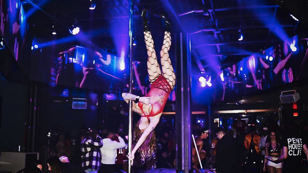 a woman from a pole in a club