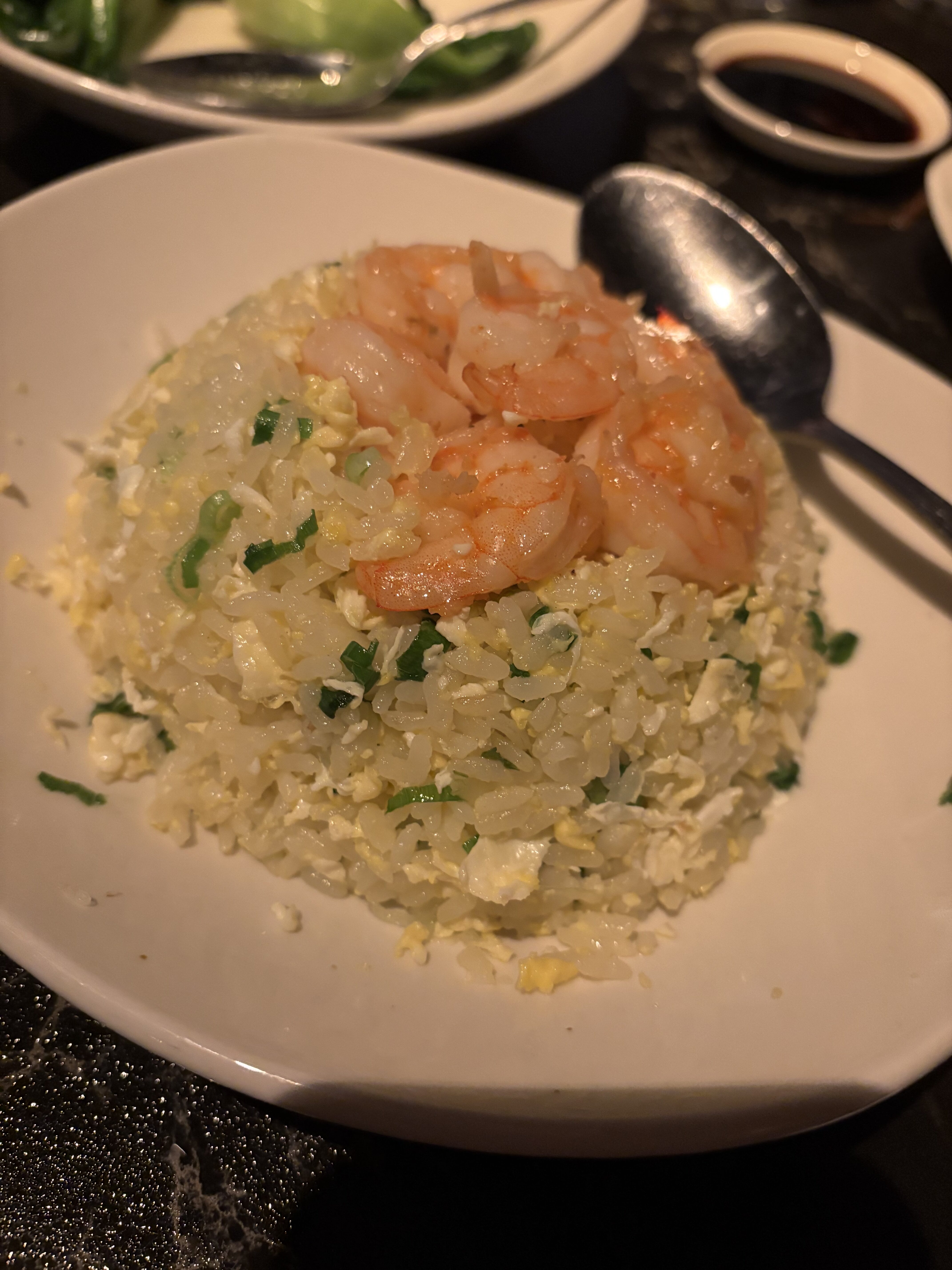 a plate of food with a spoon