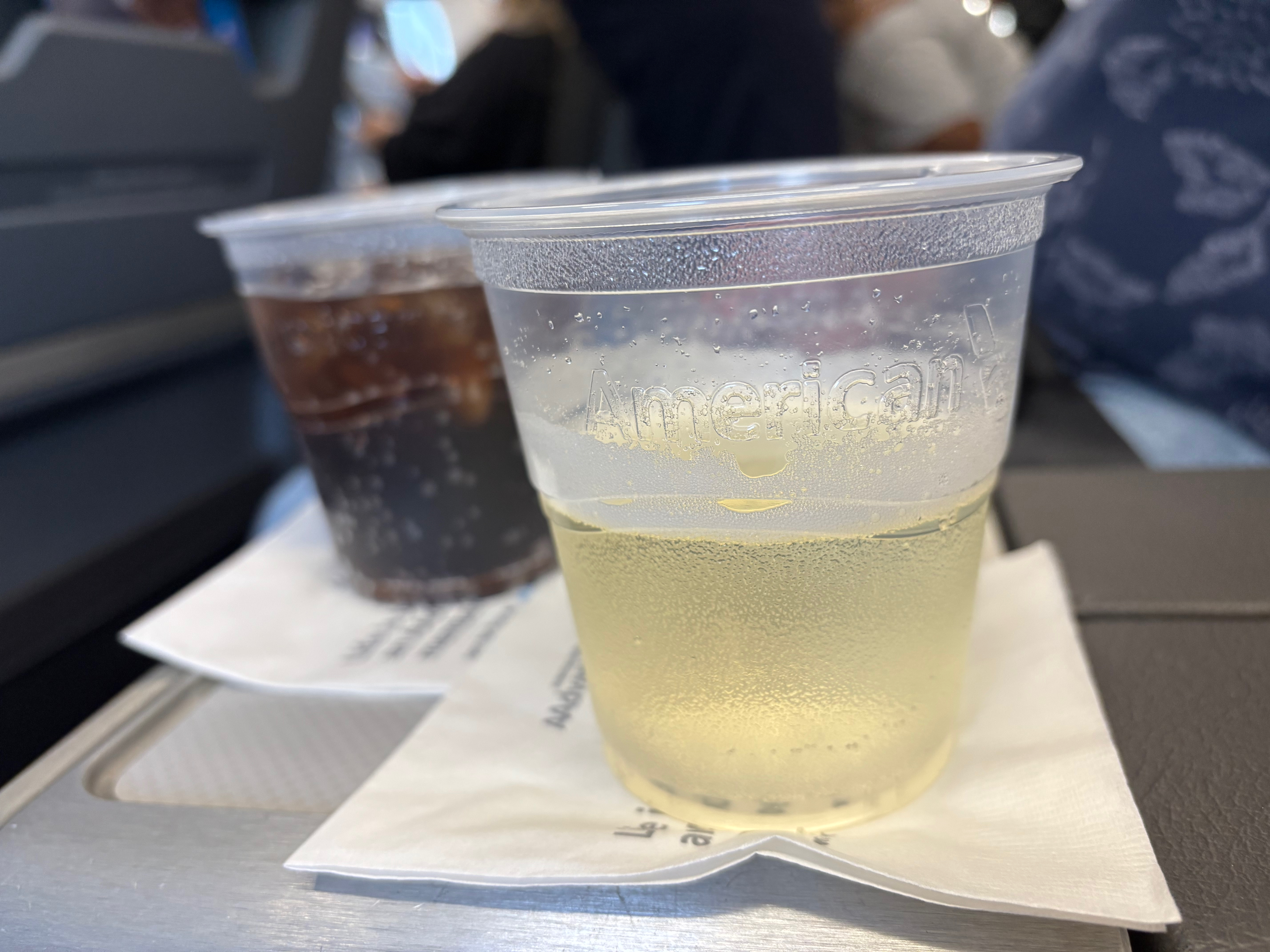 Pre-departure drinks in American Airlines First Class