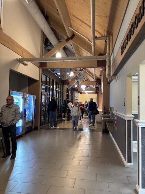 people walking in a building