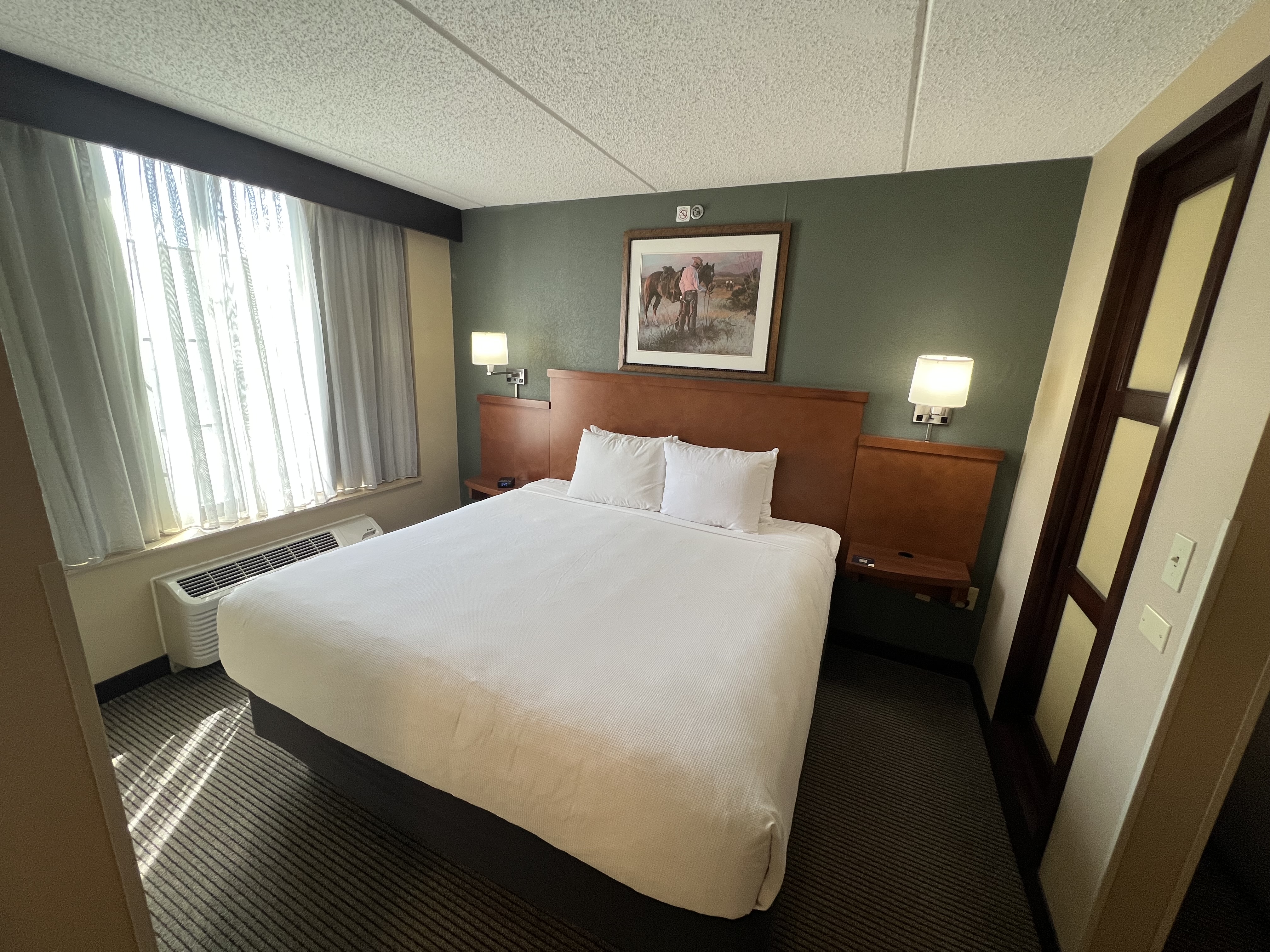 a bed in a hotel room