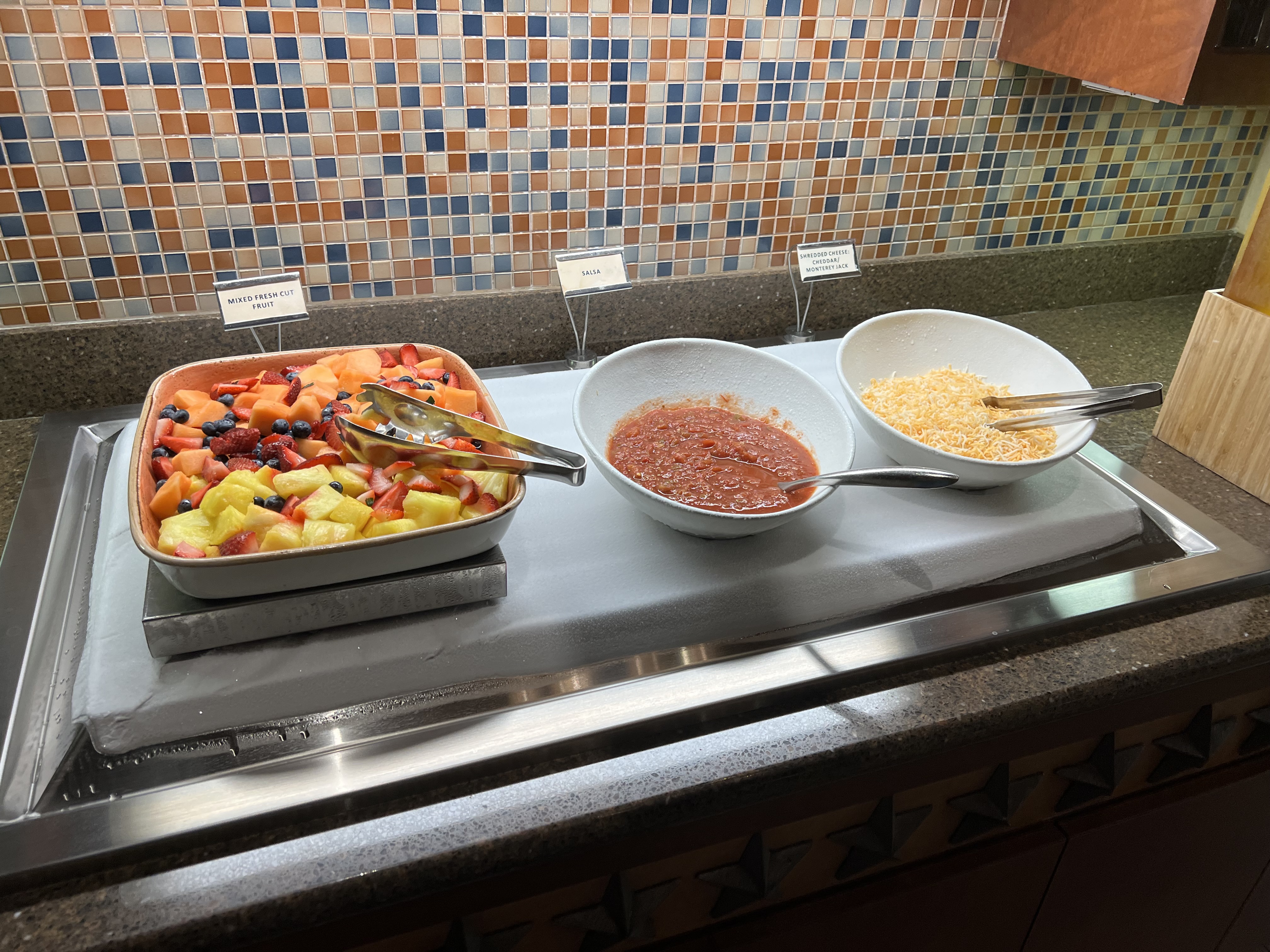 food in bowls on a counter