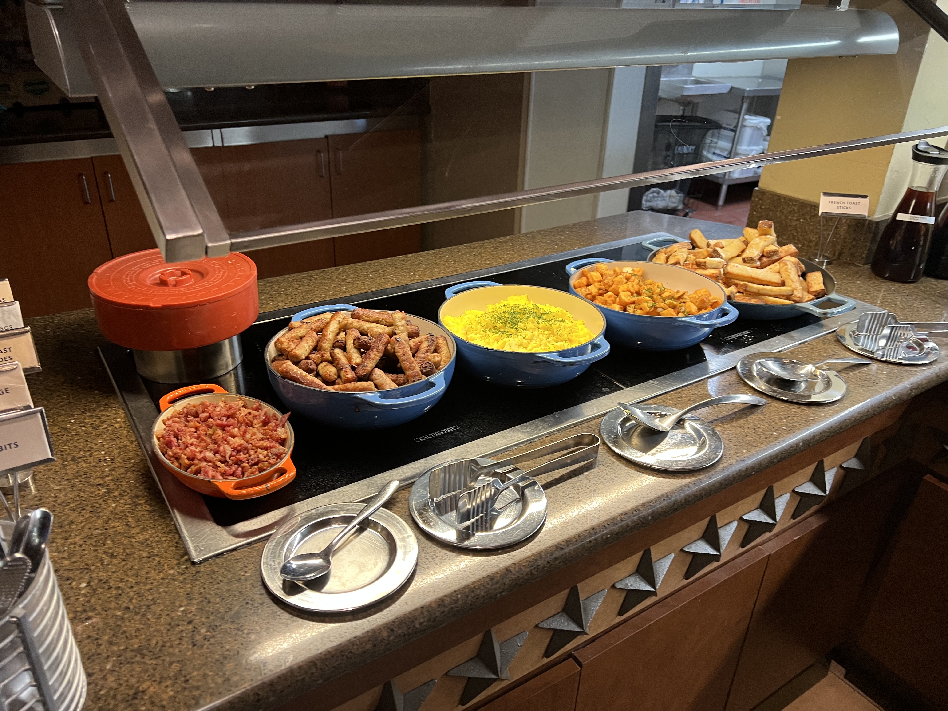 a buffet table with food on it