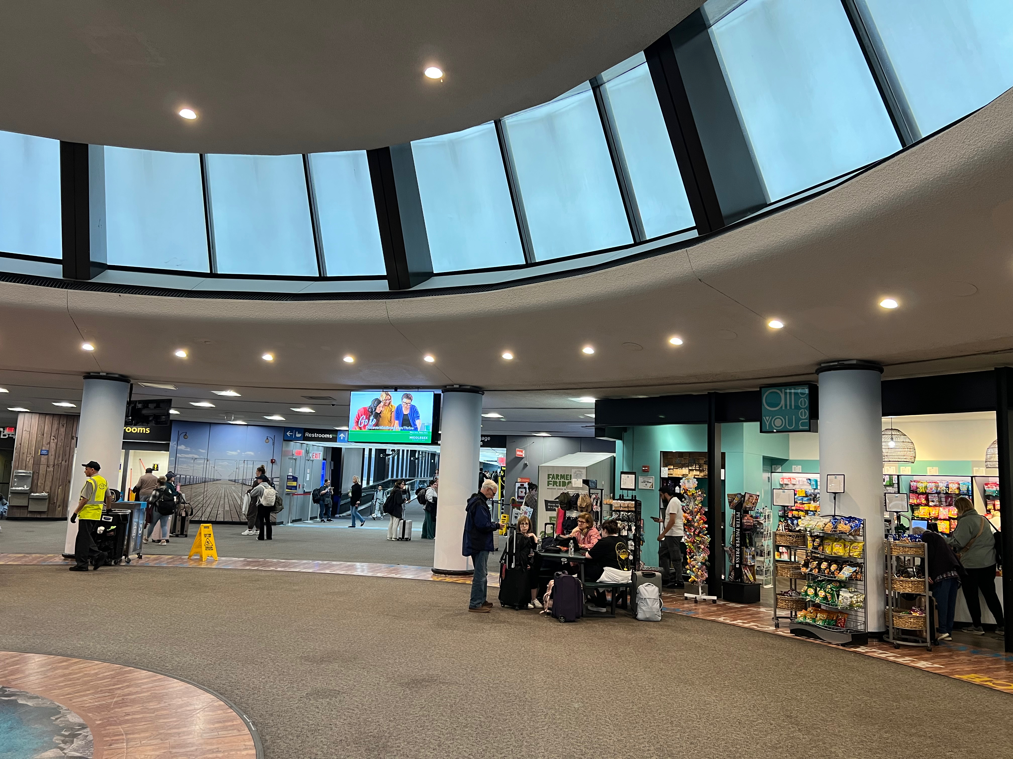 a group of people in a large airport