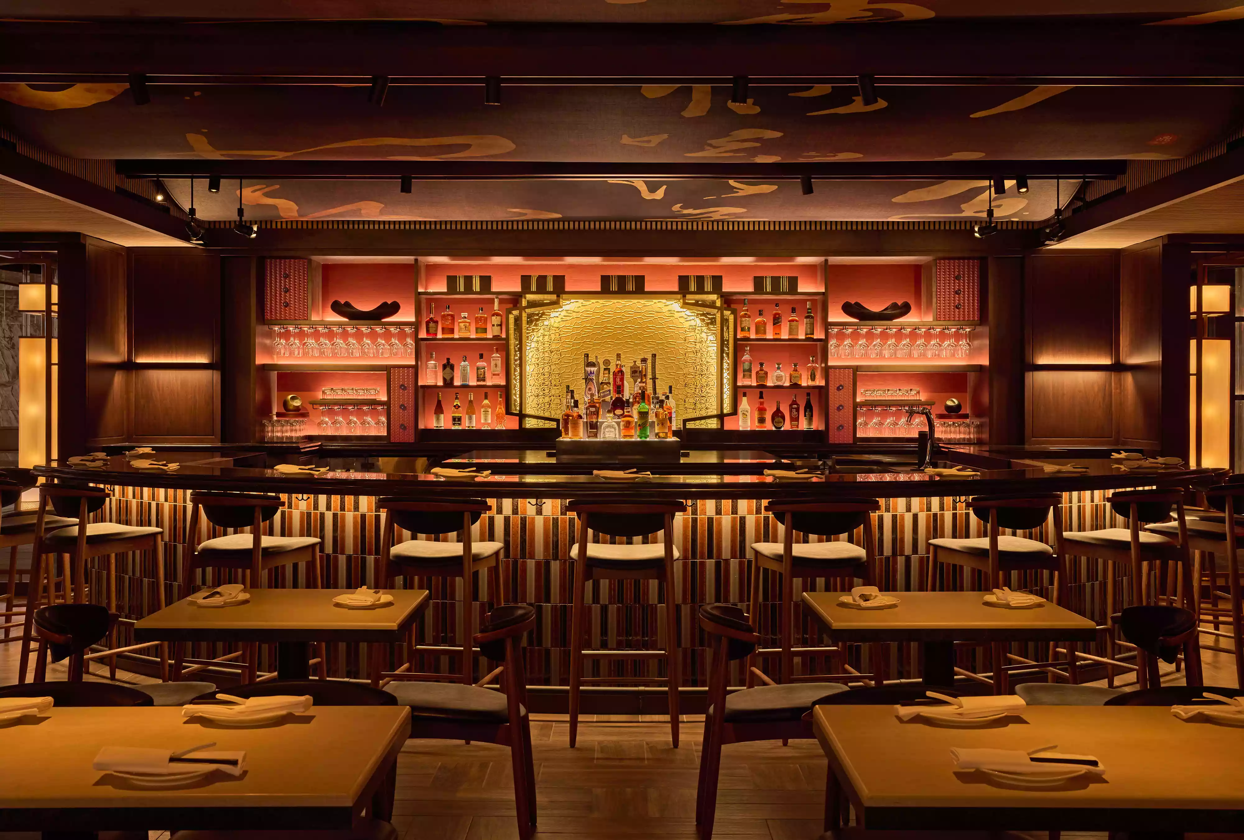 a restaurant with tables and chairs