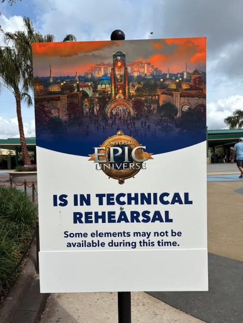 a sign with a picture of a theme park