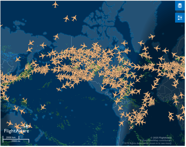 a map of the world with many small orange airplanes